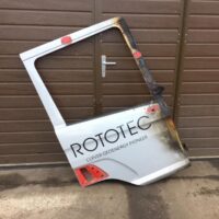 Scania jobb oldali ajtóburkolat ROTOTEC felirattal és égésnyomokkal