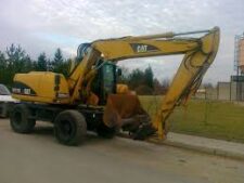 Caterpillar M313 gumikerekes kotrógép