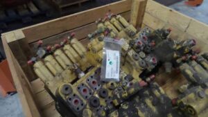 Központi elosztó caterpillar 322 kotrógéphez