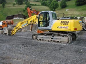 Alkatrészek new holland e245 kotrógéphez