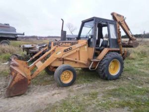 Case 480d traktor homlokrakodóval és kotrógéppel