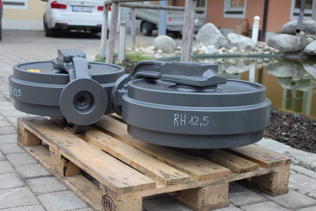 Vezetőkerék Idler RH125, átmérő 21,2 cm, D82 mm, R 27,5/30,5 cm, hossz: 52x22x21x9 cm